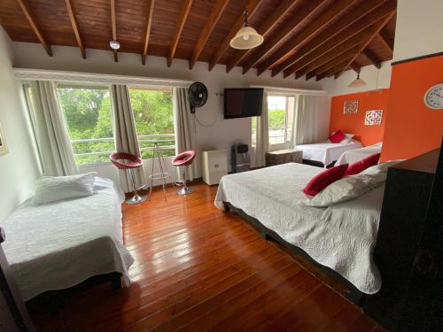 Ein Bett oder Betten in einem Zimmer der Unterkunft Hotel Lleras Premium #1
