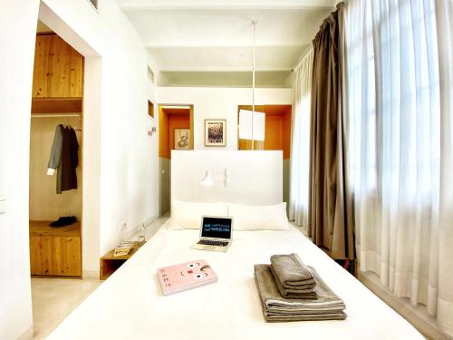 Posteľ alebo postele v izbe v ubytovaní Tyche apartment