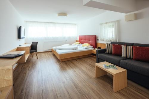 Postel nebo postele na pokoji v ubytování Hotel Rablanderhof