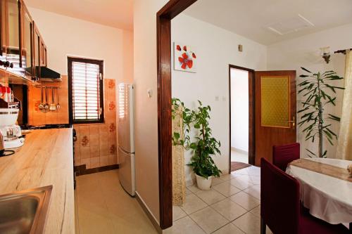 Kuchyň nebo kuchyňský kout v ubytování Apartman Miranda
