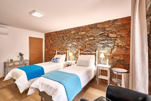 Кровать или кровати в номере Casa da Eira