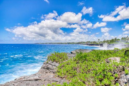 a view of the ocean from a rocky beach at Hale Kai in Keaau