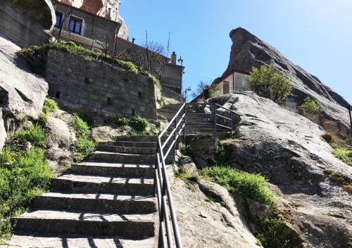 a set of stairs leading up to a building at Delfino in Pietrapertosa