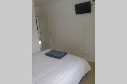 Postel nebo postele na pokoji v ubytování Hortillonne