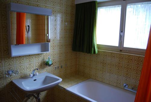 Uma casa de banho em Feriendomizil zum Schalten und Walten