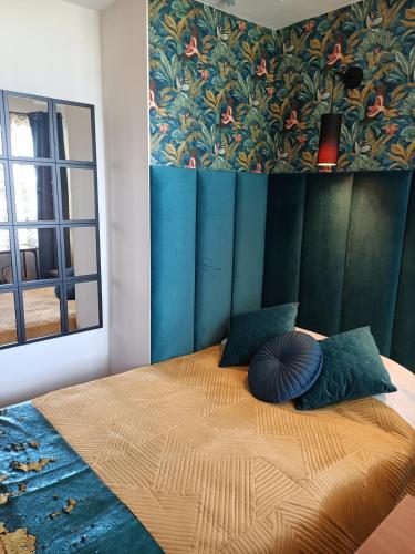 Postel nebo postele na pokoji v ubytování Vanilla Pokoje i Apartamenty Nad Brzegiem Jeziora