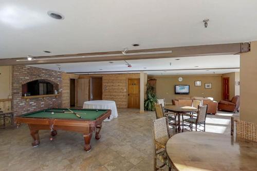 a living room with a pool table in it at Cascade 347 in Durango Mountain Resort