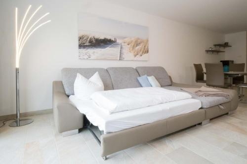 Ένα ή περισσότερα κρεβάτια σε δωμάτιο στο Bickbeeren FeWo BICKBEEREN Barbara Whg 5