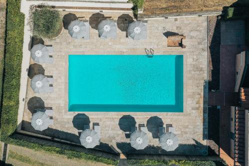 an overhead view of a swimming pool on a building at Hotel Le Colline in San Gimignano