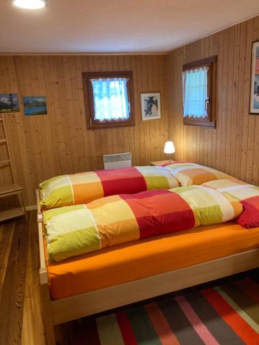 Säng eller sängar i ett rum på Alter Lärch