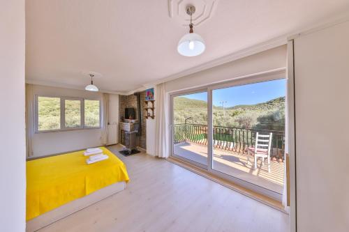 Кровать или кровати в номере Villa Candan Kaş