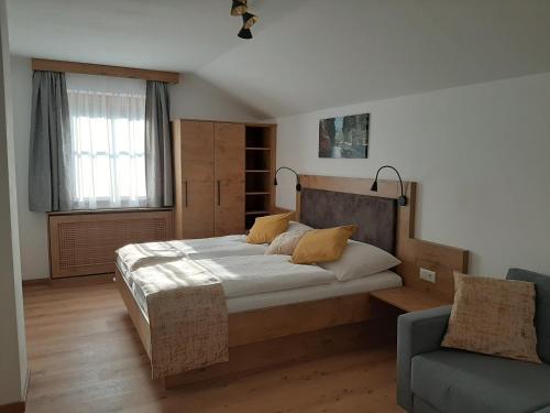 Ένα ή περισσότερα κρεβάτια σε δωμάτιο στο Apartments by Pension Ballwein