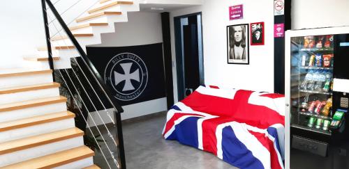 a room with a captain america bed and stairs at Blue Ocean Suites - Aeroporto Congonhas in Sao Paulo