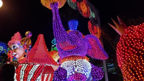 a display of christmas lights in front of a castle at VISTAS AL MAR 2 in Oropesa del Mar