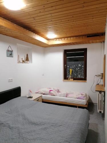 Postel nebo postele na pokoji v ubytování Schwarzwald Appartement