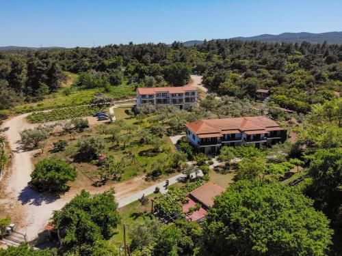 an aerial view of a resort with a large building at Dionysus Apartments & Suites in Ierissos