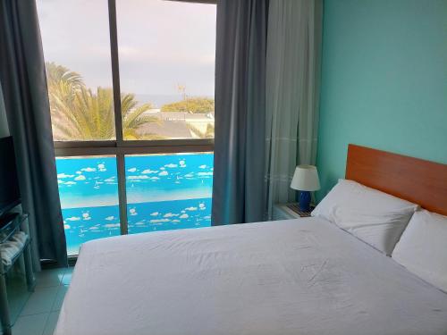 Ένα ή περισσότερα κρεβάτια σε δωμάτιο στο Fuerteventura