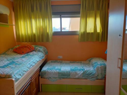 Tempat tidur dalam kamar di Fuerteventura