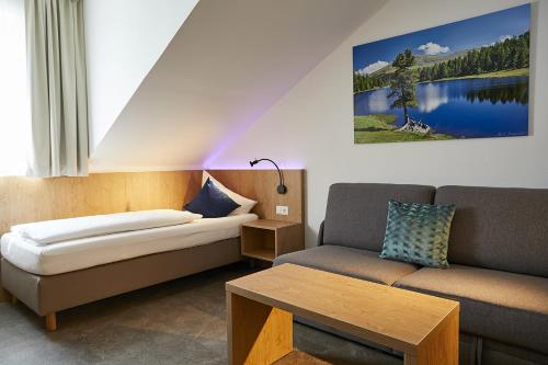 Postel nebo postele na pokoji v ubytování Dei Hotel Schönblick