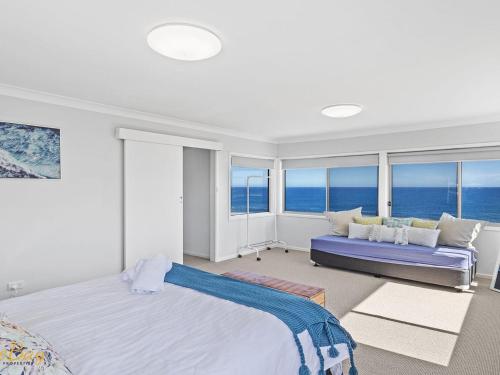 Ένα ή περισσότερα κρεβάτια σε δωμάτιο στο Elanora Ocean St No 8