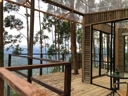 a house with a view of the forest at Latibule Glamping in La Vega