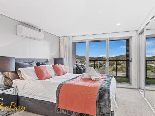 Postel nebo postele na pokoji v ubytování The Shoal 401