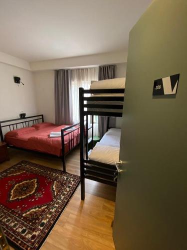 Ένα ή περισσότερα κρεβάτια σε δωμάτιο στο Vanilla Sky Boutique Hostel