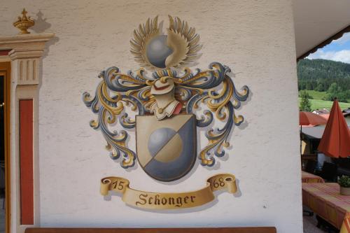 a sign on the side of a building at Tirolerhof in Lermoos