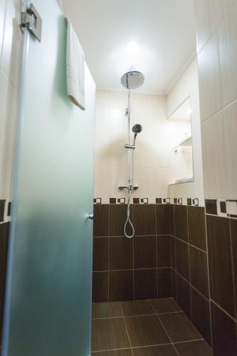 Koupelna v ubytování Abri Hotel
