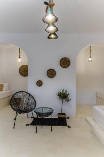 Ένα ή περισσότερα κρεβάτια σε δωμάτιο στο Amethyst Luxury Suites Oia