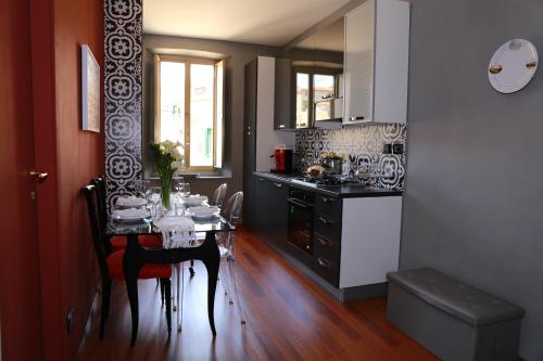 Virtuvė arba virtuvėlė apgyvendinimo įstaigoje La Casetta di Renato