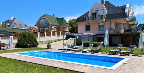 The swimming pool at or close to Nefelejcs Apartmanház