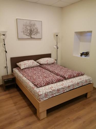 Ένα ή περισσότερα κρεβάτια σε δωμάτιο στο Guest house Baltika