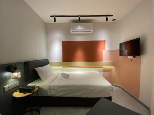 Woco Boutique Hotel Kinraraにあるベッド