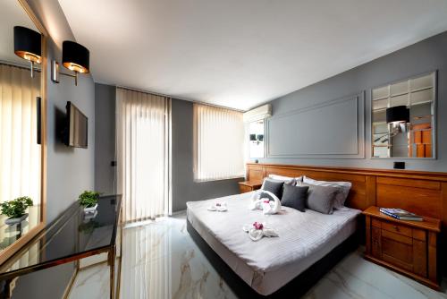 Petrov Family Hotelにあるベッド