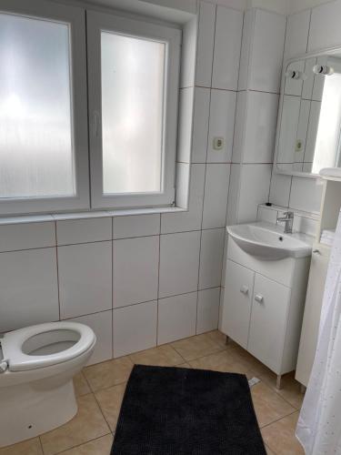 Kúpeľňa v ubytovaní Villa Leo Beach Apartment