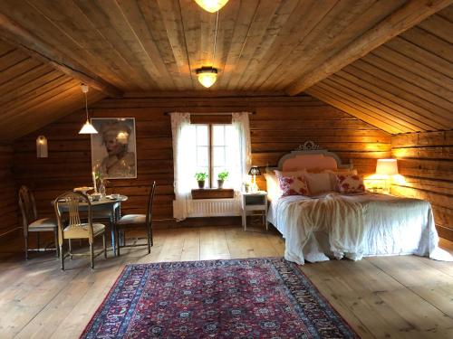Postel nebo postele na pokoji v ubytování Träslottets B&B