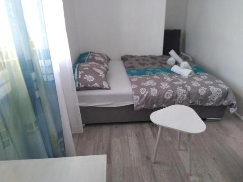 Ένα ή περισσότερα κρεβάτια σε δωμάτιο στο Apartments Lord