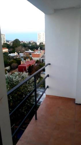 a balcony with a view of a city at SLC Maipú in San Luis