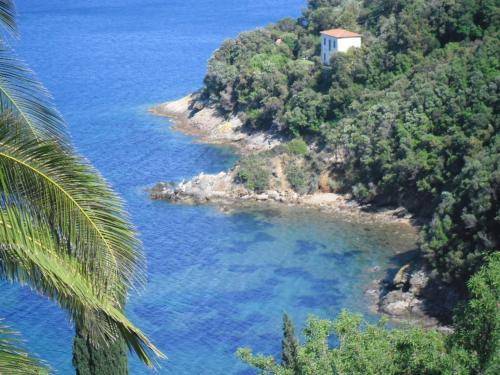 a small island in the middle of the ocean at Appartamenti Claudia Rio in Rio Marina
