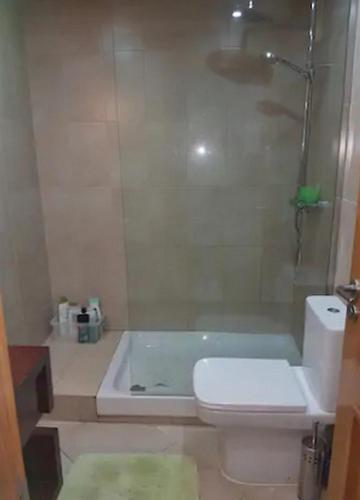 a bathroom with a shower and a toilet and a tub at Emperador 302919-A Murcia Holiday Rentals Property in Roldán