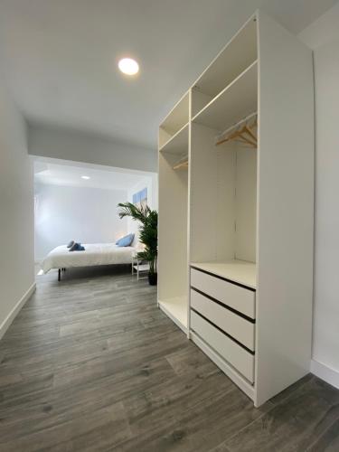 Ένα ή περισσότερα κρεβάτια σε δωμάτιο στο Design Club Santander