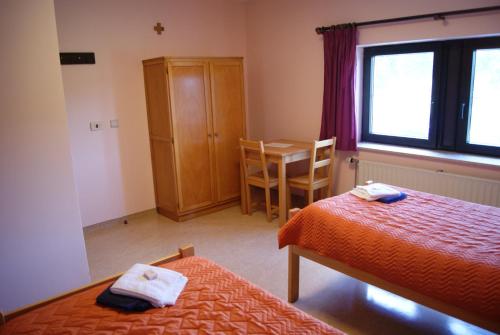 Ένα ή περισσότερα κρεβάτια σε δωμάτιο στο Chaityfontaine