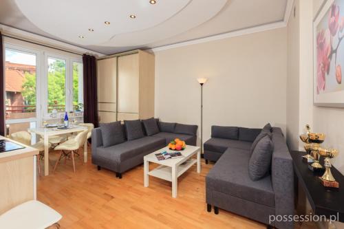 Posedenie v ubytovaní Gdańsk Old Town Łagiewniki Apartment with Balcony