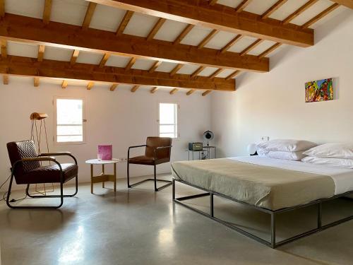 Postel nebo postele na pokoji v ubytování Fragile Hotel