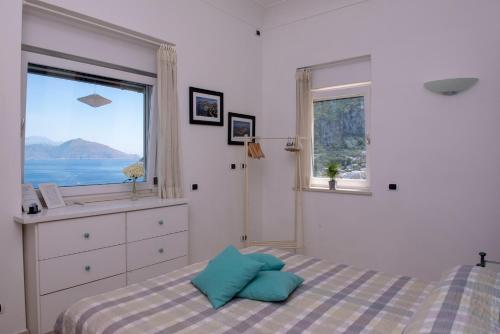 Voodi või voodid majutusasutuse B&B Punta Vivara toas