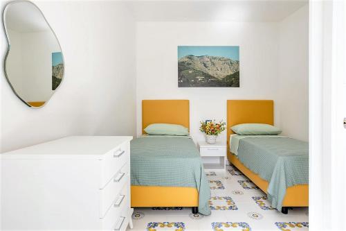 Angolo di Paradiso Sorrento Coast tesisinde bir odada yatak veya yataklar