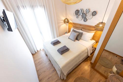 Postel nebo postele na pokoji v ubytování Skiathos Gea Villas