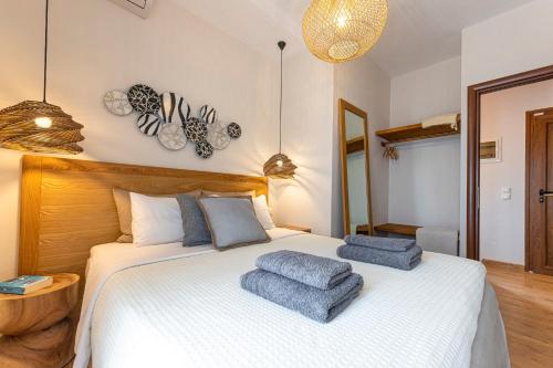 Postel nebo postele na pokoji v ubytování Skiathos Gea Villas