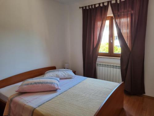 Postel nebo postele na pokoji v ubytování N&G Apartments